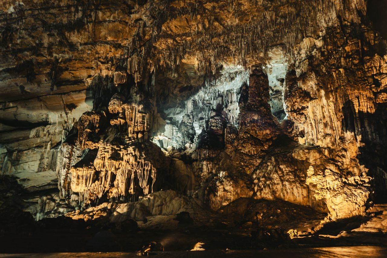 Explore the stunning stalactites and rock formations of Crucero de Grutas, Mexico.